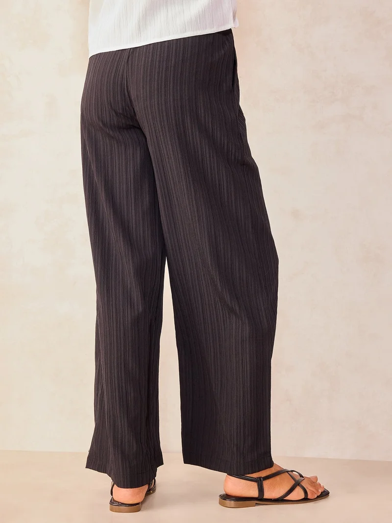 Outzidr  Black Textured Pull On Wide Leg Trouser for Women | Best Price UAE